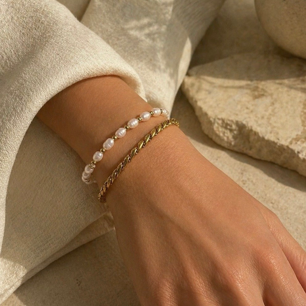 LEAH Link Gold Bracelet stacked , 18K gold PVD polished link chain, styled wrist shot with pearl bracelet – CCaura
