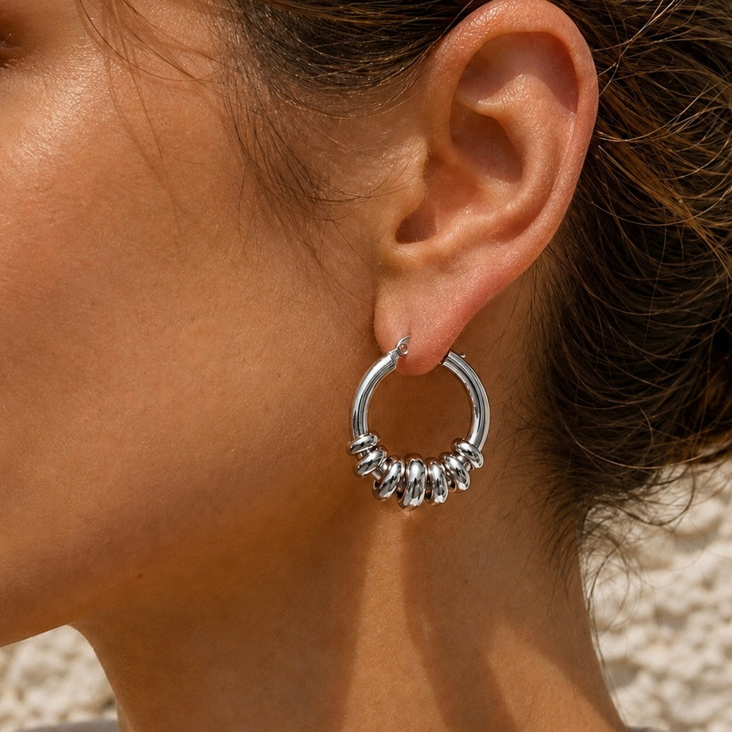OASIS Silver Hoops worn by model– CCaura