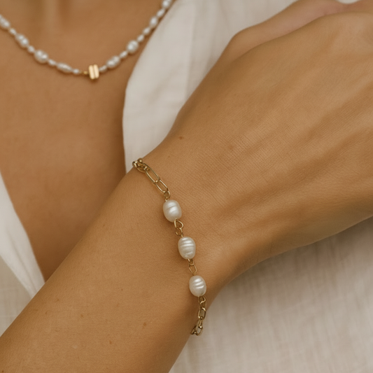 ISLA Gold Bracelet worn on wrist, freshwater pearl and 18K gold PVD paperclip chain bracelet – CCaura