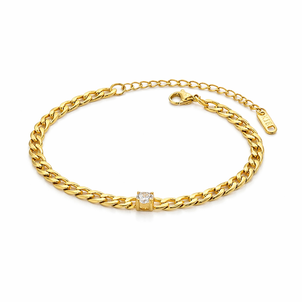 AURELIA Chain Gold Bracelet, 18K gold PVD curb chain with single cubic zirconia crystal, 17.5cm, flat lay – CCaura