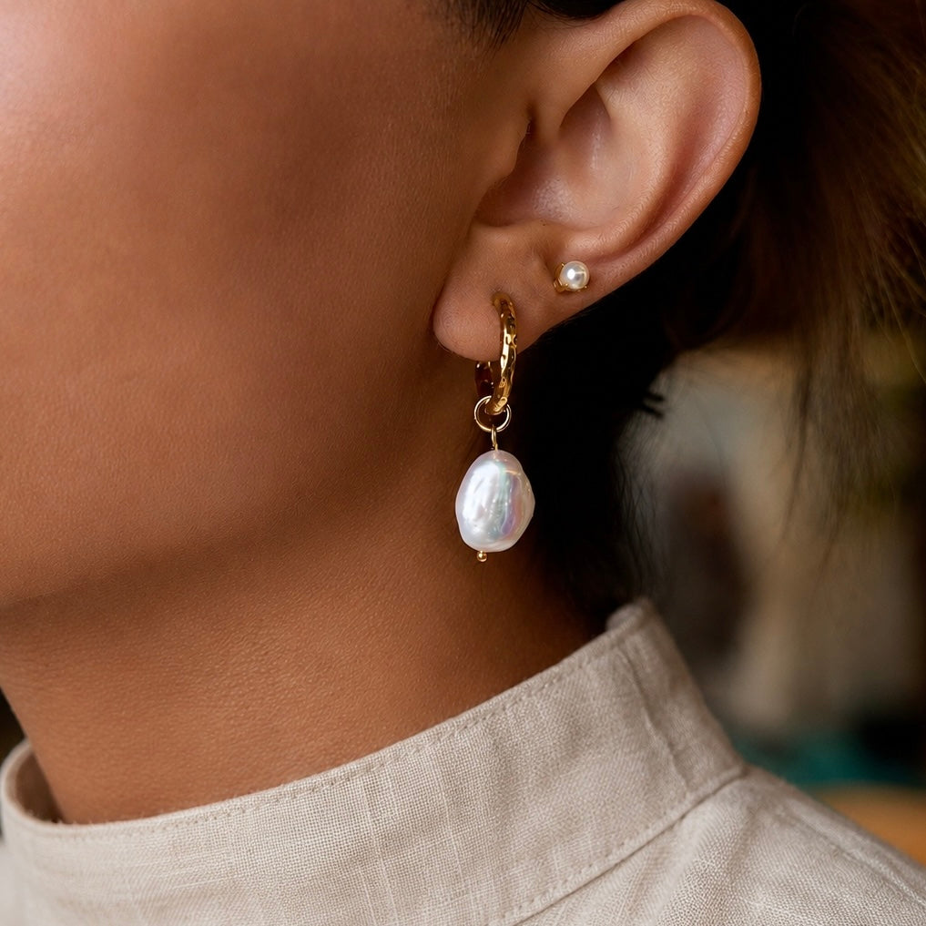 ISLA BAROQUE PEARL HOOPS layered, worn by model-CCaura