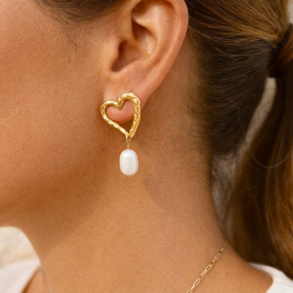 HERA Pearl Heart Earrings worn by model– CCaura