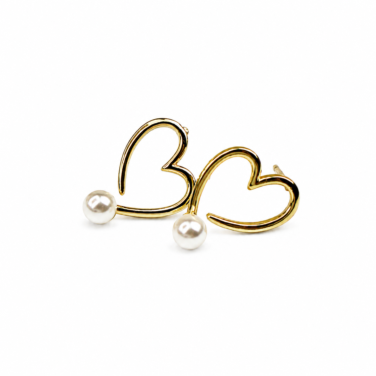 CELESTE PEARL HEART EARRINGS on white background - CCAura
