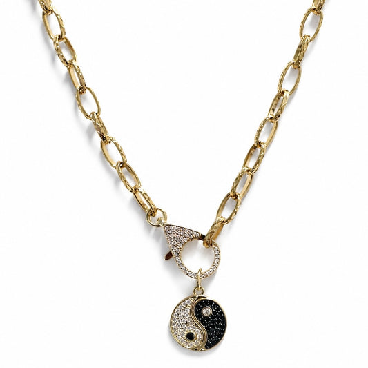 Yin Yang Gold Necklace with 18K gold PVD coating, pavé clasp and ying yang charm on white background - CC Aura