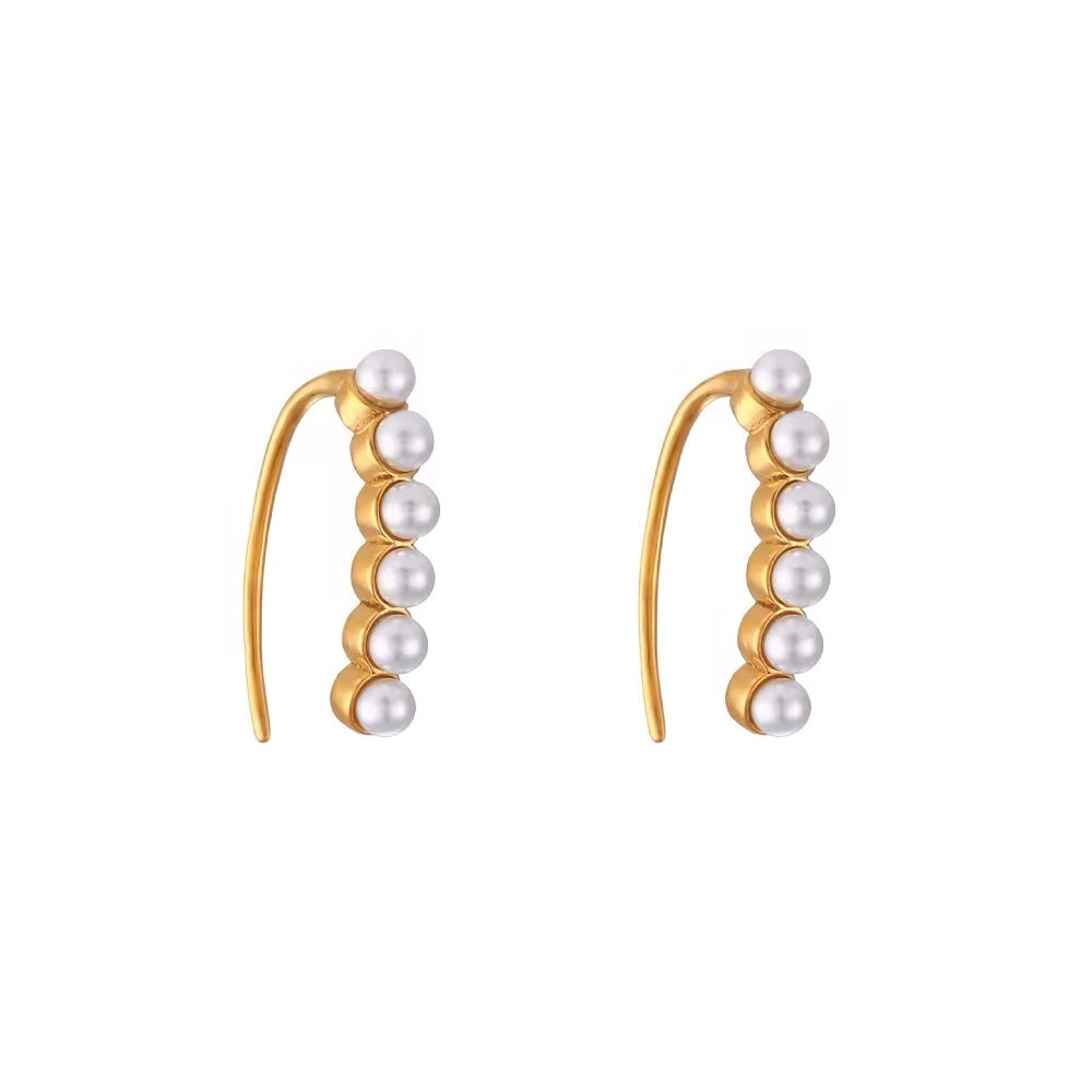 ELYSIAN PEARL HUGGIES gold earrings CCaura white background